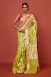 Buy_Pinki Sinha_Green Kora Silk Handwoven Floral Stripe Pattern Saree With Running Blouse _at_Aza_Fashions