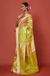 Pinki Sinha_Green Kora Silk Handwoven Floral Stripe Pattern Saree With Running Blouse _at_Aza_Fashions