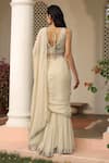 Shop_SAISHA_Ivory Net Embroidery Sequin V Neck Border Draped Pant Saree With Blouse _at_Aza_Fashions