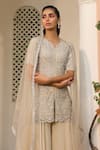 SAISHA_Ivory Net Embroidery Sequin Leaf Neck Scallop Peplum Kurta Sharara Set _Online_at_Aza_Fashions