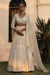 Buy_SAISHA_Ivory Organza Silk Embroidery Sequin V Neck Bridal Lehenga Set _at_Aza_Fashions