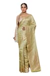 Pinki Sinha_Green Banarasi Pure Silk Handwoven Flower Stripe Saree With Running Blouse _Online_at_Aza_Fashions