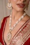 Shop_Anana_Gold Plated Beads, Metallic Thread Mishika Mughal Carved Pendant Necklace Set _at_Aza_Fashions