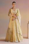 Buy_SHASHANK ARYA_Yellow Organza Embroidery Pearl Plunge V Neck Leaf Stripe Bridal Lehenga Set _at_Aza_Fashions