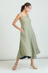 Samyukta Singhania_Green Linen Mix Solid Square Side Wooden Button Pastel Dress _Online_at_Aza_Fashions