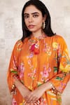 Shop_Rainas_Orange Cotton Silk Printed Floral Tie-up Tasseled Kurta And Pant Set _at_Aza_Fashions