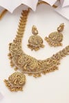 MUDRA LUXE_Gold Plated Stone Radha-krishna Carved Long Temple Necklace Set _Online_at_Aza_Fashions