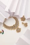 Shop_SUIKALA_Gold Plated Goddess Carved Motif Temple Necklace Set _at_Aza_Fashions