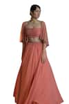 Shop_Damoiselle_Peach Georgette Net Hand Embroidery Floral Bustier Aurora Cape And Lehenga Set _Online_at_Aza_Fashions