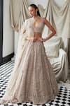 Buy_Istya_Beige Tissue Organza Embroidery Sequins Paan Neck Floral Bridal Lehenga Set _at_Aza_Fashions