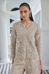 Shop_Istya_Beige Net Embroidery Sequin Notched Cutdana Jacket And Flared Pant Set _at_Aza_Fashions