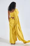 Shop_NA-KA_Yellow Satin Solid Asymmetric Flare Trail Side Top Maxi Dress _at_Aza_Fashions