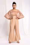 Buy_Ellemora fashions_Beige Shimmer Tissue Solid Off Shoulder Yoke Flared Jumpsuit _at_Aza_Fashions