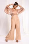 Buy_Ellemora fashions_Beige Shimmer Tissue Solid Off Shoulder Yoke Flared Jumpsuit _Online_at_Aza_Fashions