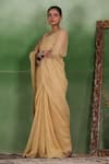 Shop_Geroo Jaipur_Beige Tissue Plain Crushed Shimmer Finish Saree With Unstitched Blouse Piece _at_Aza_Fashions