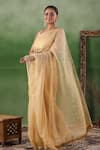 Shop_Geroo Jaipur_Beige Tissue Plain Crushed Shimmer Finish Saree With Unstitched Blouse Piece _Online_at_Aza_Fashions