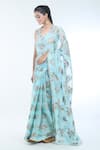 Bhumika Sharma_Blue Organza Printed Sylvia Floral V Neck Saree With Blouse _Online_at_Aza_Fashions