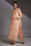 SHIKHA MALIK_Peach Silk Chanderi Cut Work Kurta And Inner Round Chandra Pintuck Detailed Set _at_Aza_Fashions