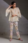 Buy_SHIKHA MALIK_White Satin Hand Block Print Chevron Khamosh Lamhe Pant _at_Aza_Fashions