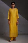 Buy_SHIKHA MALIK_Yellow Silk Chanderi Cut Work Kurta And Inner Pintuck Detailed Straight Set _at_Aza_Fashions