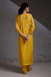 Shop_SHIKHA MALIK_Yellow Silk Chanderi Cut Work Kurta And Inner Pintuck Detailed Straight Set _at_Aza_Fashions