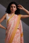 SHIKHA MALIK_Peach Silk Chanderi Hand Block Print Geometric Floral Saree _at_Aza_Fashions