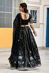 Shop_SUTI KAPDA_Black Saatan Silk Print Lotus Bloom Paan Neck Lehenga Set _at_Aza_Fashions