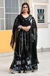 SUTI KAPDA_Black Saatan Silk Print Lotus Bloom Paan Neck Lehenga Set _Online_at_Aza_Fashions