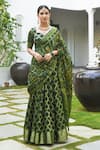 Buy_SUTI KAPDA_Green Banarasi Silk Woven Paisley Sweetheart Checkered Lehenga Set _at_Aza_Fashions