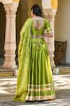 Shop_Suti Kapda_Green Taffeta, Silk Lace V-neck Border Panelled Lehenga Set _at_Aza_Fashions