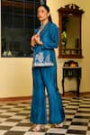 Shop_Ajiesh Oberoi_Blue Upada Silk Embroidered Crystal Lapel Vaani Deer Motif Jacket Pant Set _Online_at_Aza_Fashions