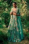 Buy_Bhumika Sharma_Blue Georgette Embroidered Sequins Bustier Sylvia Flower Print Lehenga Cape Set _at_Aza_Fashions