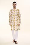 Buy_Arihant Rai Sinha_Yellow Soft Cotton Print Tie Dye Swerve Kurta With Churidar _at_Aza_Fashions