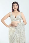 Seema Gujral_White Embroidered Zari Plunged Paisley Mirror Saree With Blouse _at_Aza_Fashions