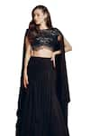 Aayushi Maniar_Black Skirt Georgette Hand Embroidered Sequins Closed Round Draped With Top _at_Aza_Fashions