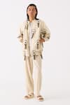 THREE_Ivory Handloom Cotton Embroidered Thread Bomber Jacket Pant Set _at_Aza_Fashions