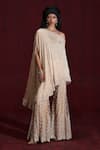 Buy_Rococo_Beige Net Embroidered Sequin One-shoulder Lana Cape With Sharara _at_Aza_Fashions