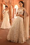 Niamh By Kriti_Ivory Organza And Net Embroidery Floral Paan Neck Hand Lehenga Set _Online_at_Aza_Fashions