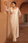 Buy_Niamh By Kriti_Ivory Silk Crepe Embellished Wave Pre-draped Textured Saree With Blouse _at_Aza_Fashions