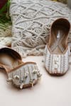 Buy_Jutti Express_Off White Cowrie Shells Embellished Boho Juttis _at_Aza_Fashions