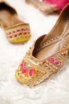 Shop_Jutti Express_Yellow Ghungroo And Gota Lace Bloom Embellished Juttis _Online_at_Aza_Fashions