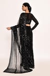 Shop_Seema Gujral_Black Net Embroidered Sequins Plunged V Neck Saree With Blouse _at_Aza_Fashions