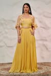 Buy_Nidhi Kejriwal_Yellow Georgette Embellished Cutdana Short Cape Front Open Pleated Skirt Set _at_Aza_Fashions