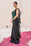 Nidhi Kejriwal_Black Crepe Hand Embroidered Cutwork Sweetheart Pre-draped Saree With Blouse _Online_at_Aza_Fashions