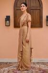 Nidhi Kejriwal_Brown Tissue Hand Embellished Cutdana Bustier Pre-draped Saree Set With Shrug _Online_at_Aza_Fashions