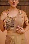 Buy_Nidhi Kejriwal_Brown Tissue Hand Embellished Cutdana Bustier Pre-draped Saree Set With Shrug _Online_at_Aza_Fashions