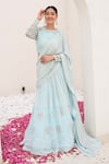 Buy_Nidhi Kejriwal_Sky Blue Georgette Embroidered Sequins Attached Draped Lehenga With Blouse _at_Aza_Fashions