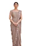 Nidhi Kejriwal_Pink Georgette Stripe Embroidered Cutdana Pre-draped Saree With Peplum Blouse _Online_at_Aza_Fashions