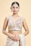 Samyukta Singhania_Cream Georgette Embroidered Thread Plunge-v Floral Saree Blouse _Online_at_Aza_Fashions