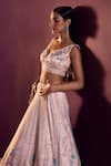 Angad Singh_Peach Net Embroidery Sequin Sweetheart Neck Floral Bridal Lehenga Set _at_Aza_Fashions